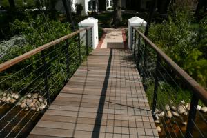 Beautiful draw bridge built over water feature