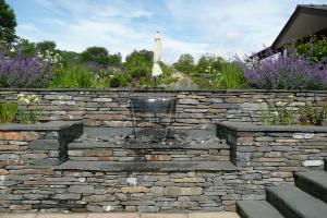 Water cascade with local slate walls Water cascade with local slate walls