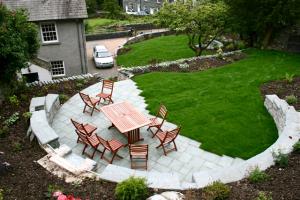 The result between winter and spring with the landscaping works Chapel Style, Langdale, Lake District; final stages in landscaping