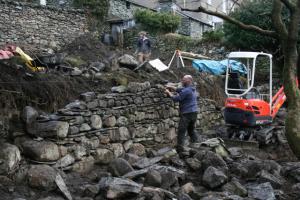 Our stone waller hard at work during the landscaping works Chapel Style, Langdale, Lake District; our stone waller hard at work