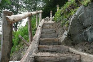 Rustic staircase in Finsthwaite, Cumbria Rustic wooden staircase made from locally sourced cleft oak in the lake District