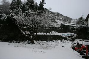 Challenging weather conditions for the men to work in Chapel Style, Langdale, Lake District garden in the winter at -15 degrees